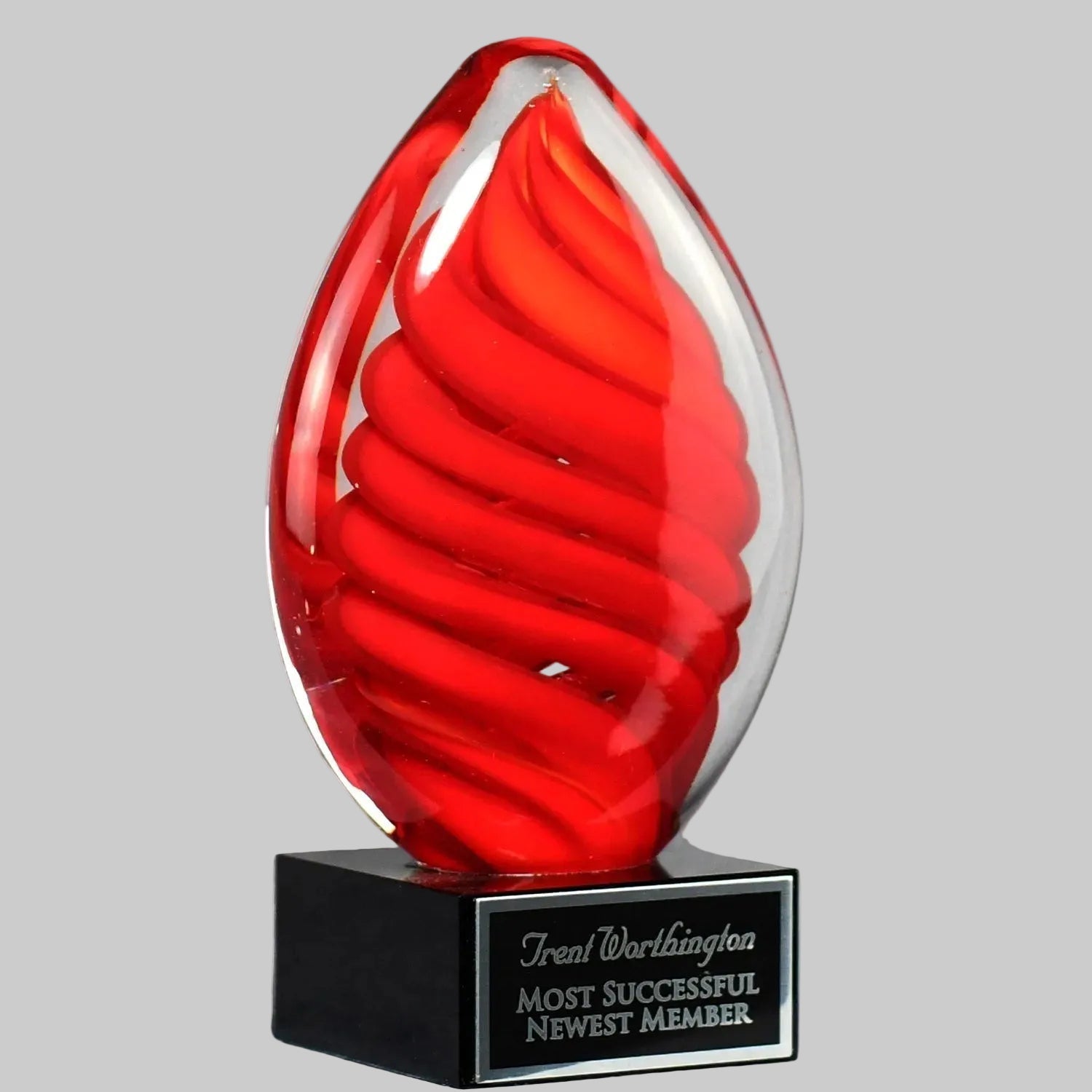 Red Swirl Egg on Black Glass Base